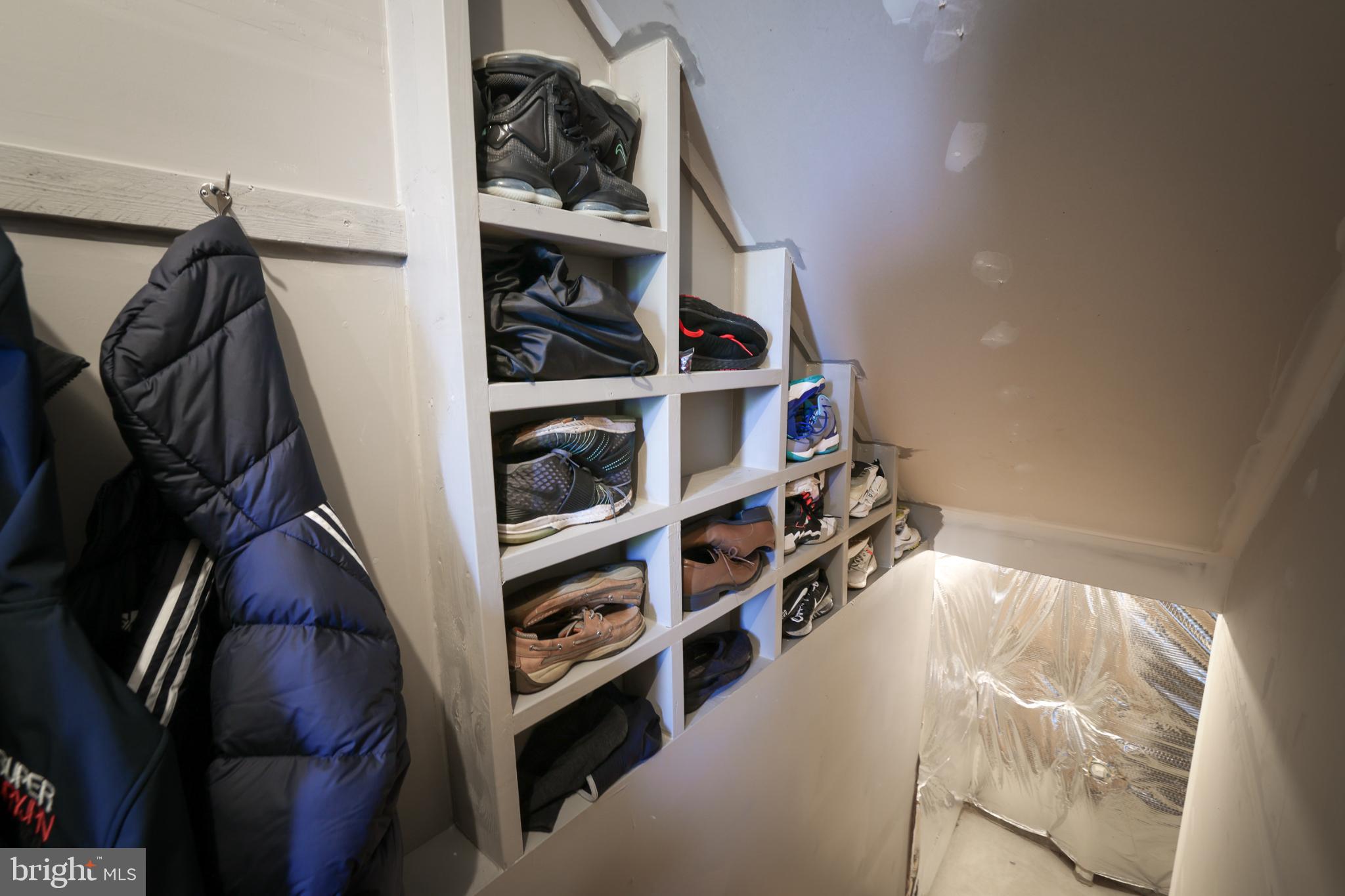 7069 Wise Lane King George, VA 22485 - Photo 35 of 39 Stylish storage under the stairs.