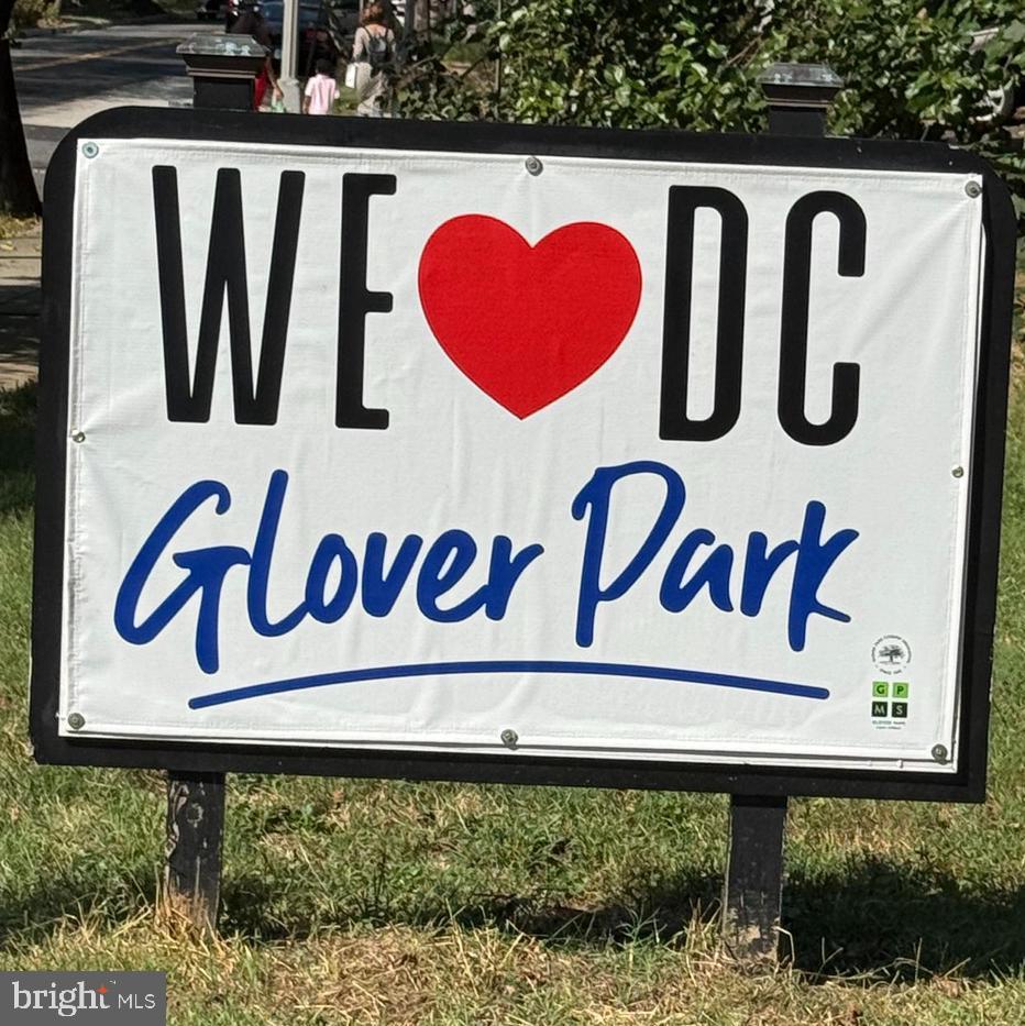 2134 Wisconsin Avenue Northwest, Unit 6 Washington, DC 20007 - Photo 37 of 40 a sign that is on the wall of the street