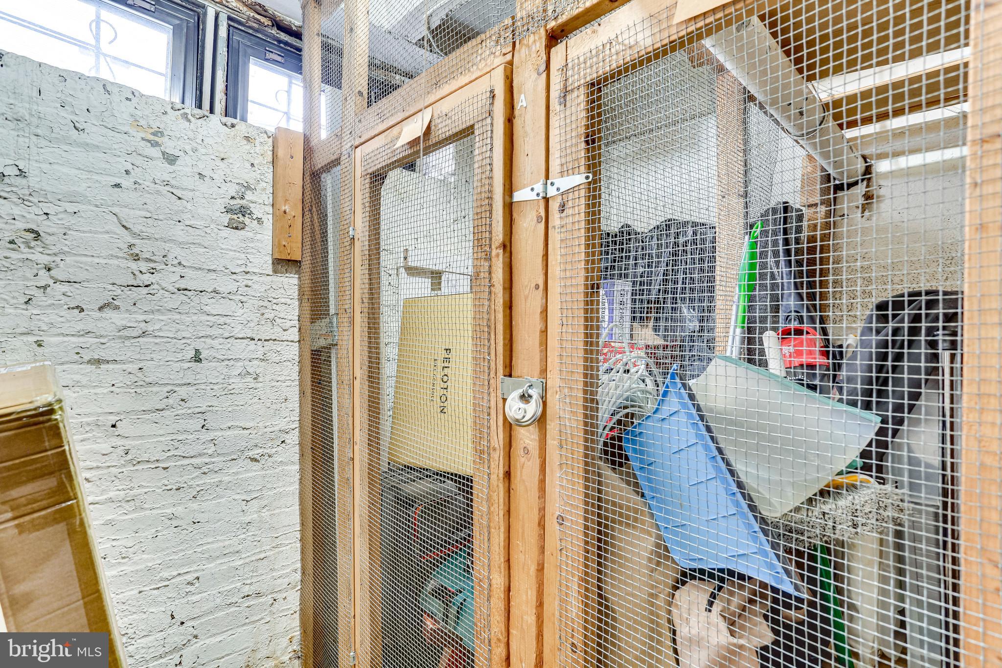 2227 20th Street Northwest, Unit 405 Washington, DC 20009 - Photo 23 of 27 Large storage unit at the end of the storage room