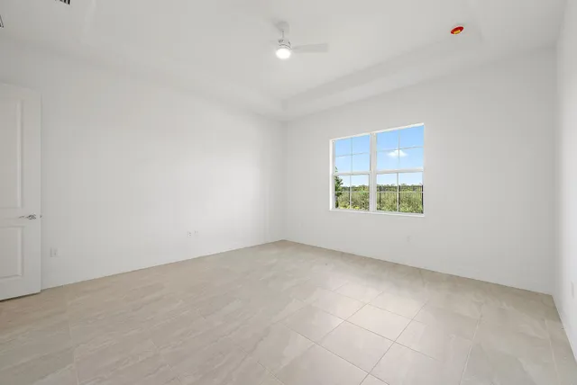 a bathroom with a double vanity sink and mirror