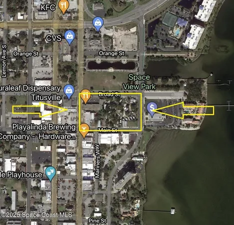 a view of city street with a building in the background