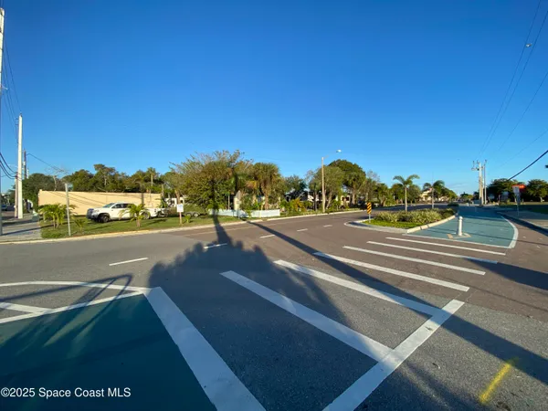 a view of street with large building