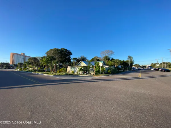 a view of a city street both of a house