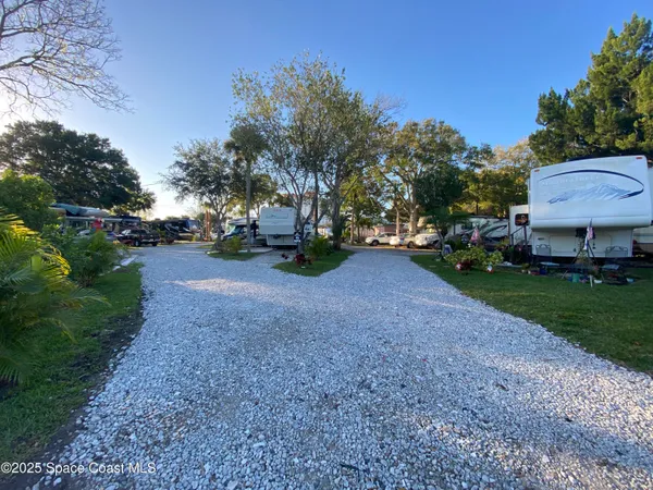 a view of a house with a street