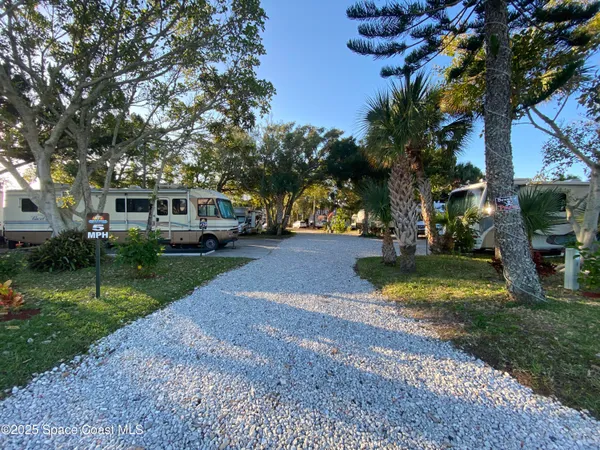 a view of a street with cars