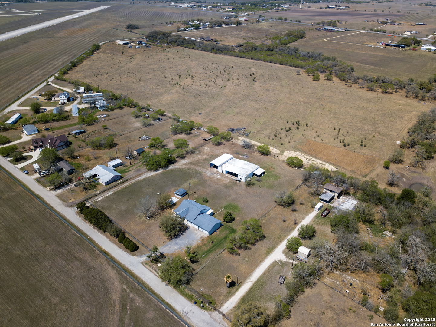 641 Weber Road Seguin, TX 78155 - Photo 26 of 27 an aerial view of house with a yard