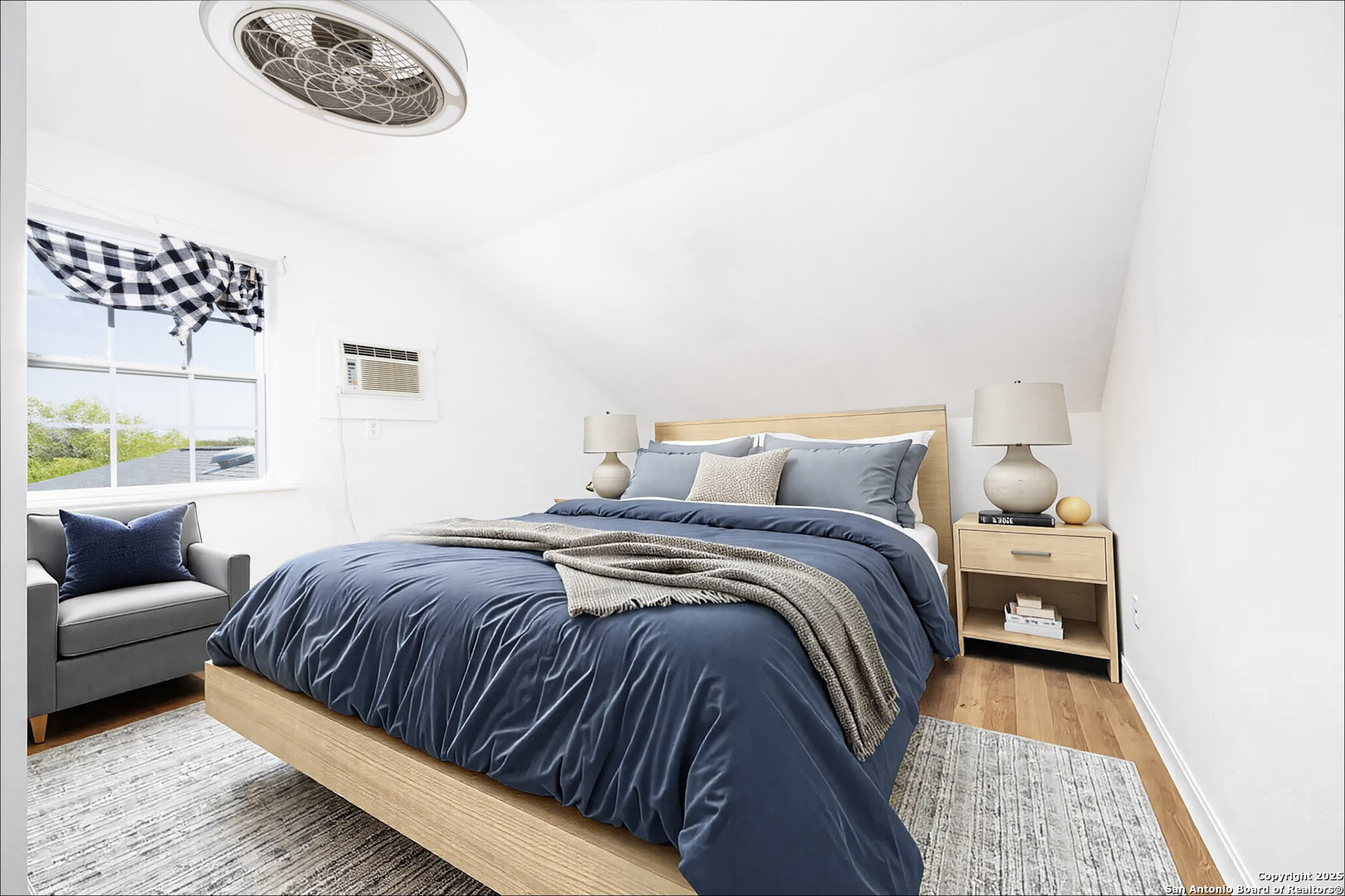 641 Weber Road Seguin, TX 78155 - Photo 6 of 27 a bedroom with a bed and a couch