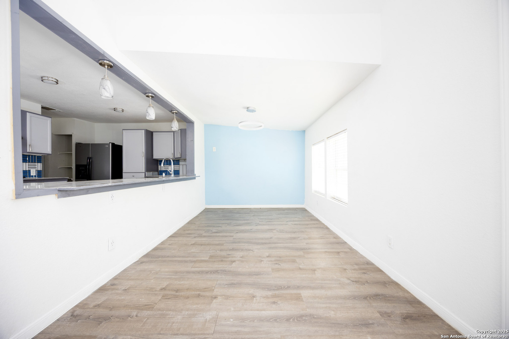 641 Weber Road Seguin, TX 78155 - Photo 8 of 27 a view of a kitchen with a sink and a window