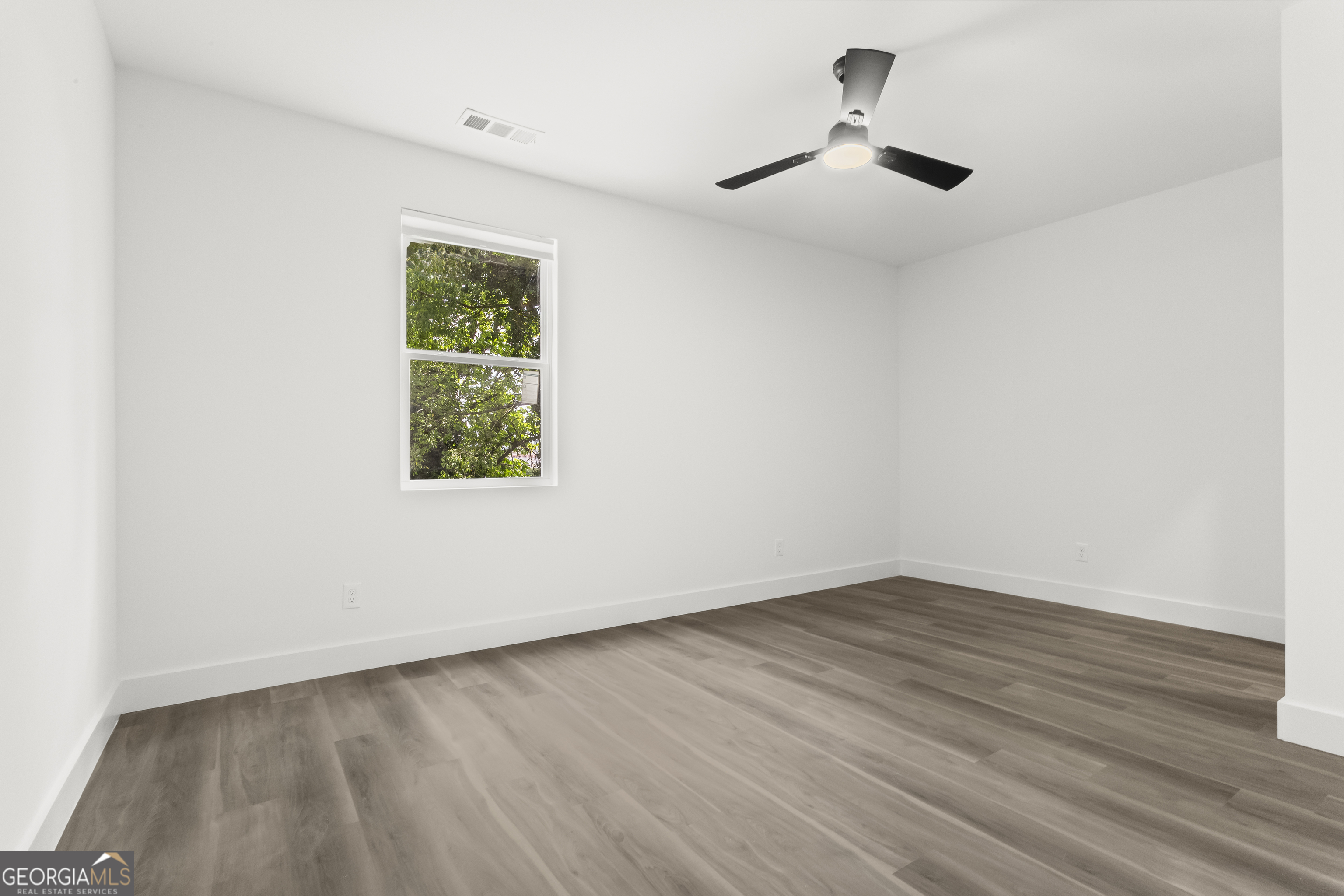598 Formwalt Street Southwest Atlanta, GA 30312 - Photo 19 of 23 wooden floor in an empty room