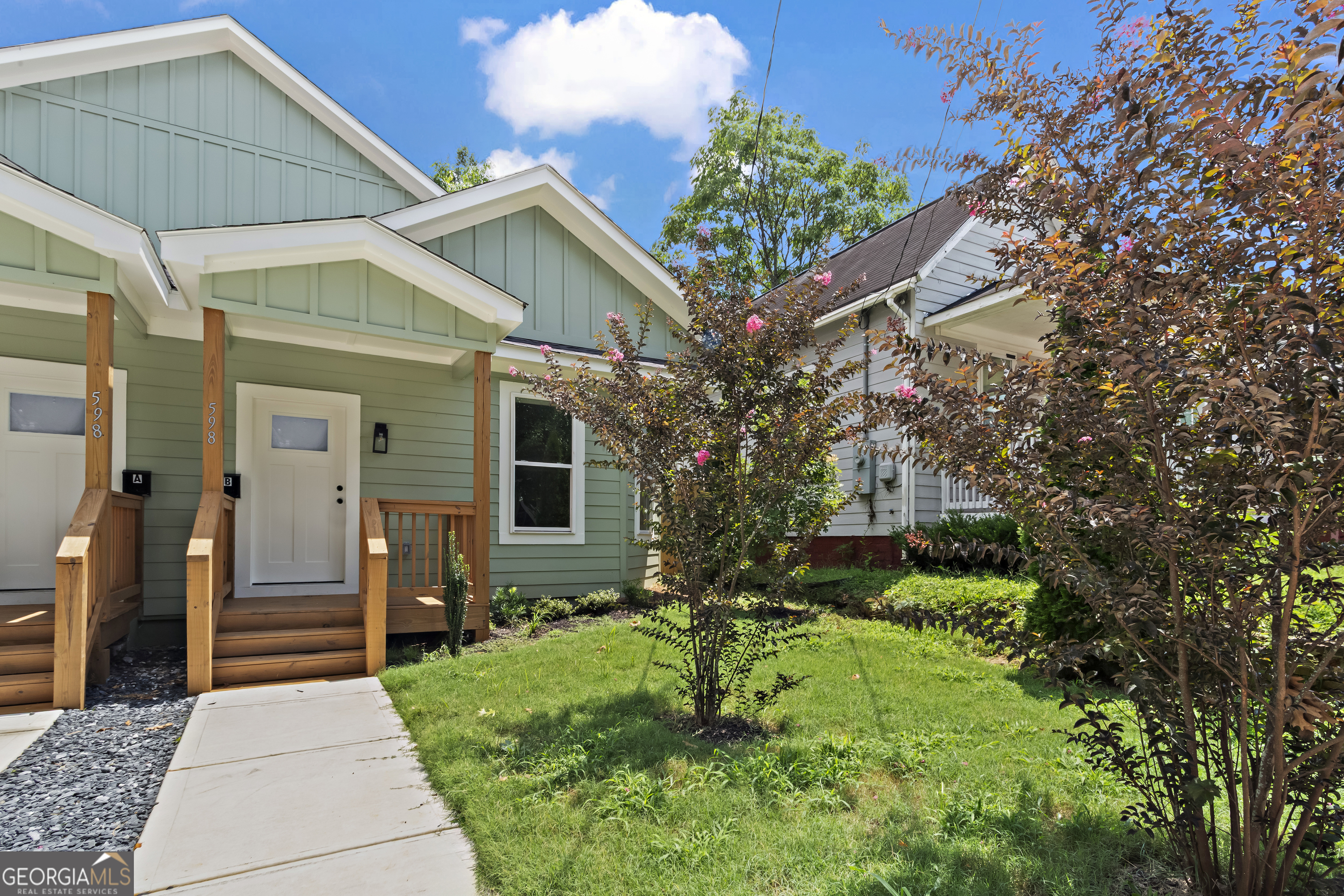 598 Formwalt Street Southwest Atlanta, GA 30312 - Photo 2 of 23 a front view of a house with garden