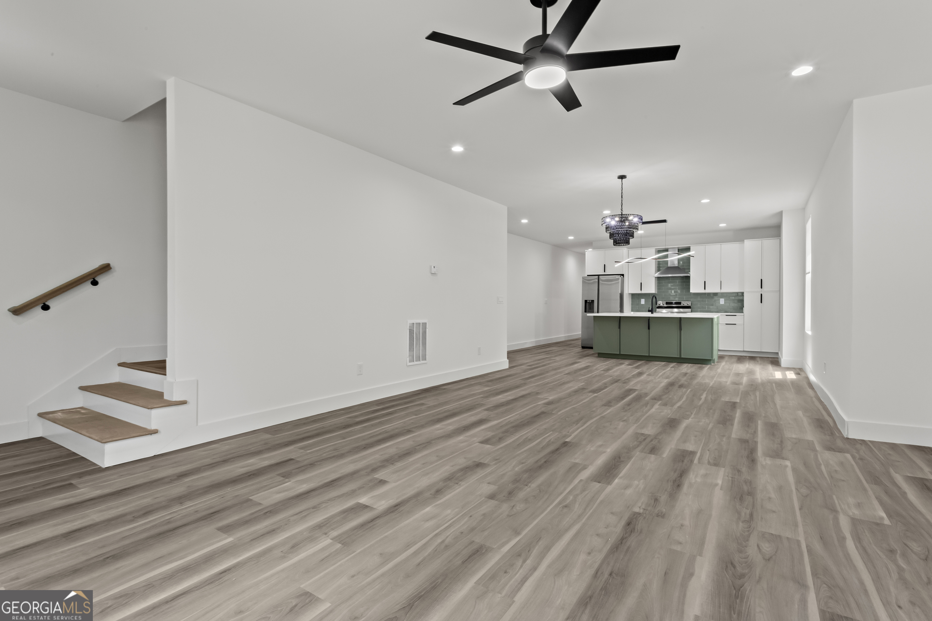 598 Formwalt Street Southwest Atlanta, GA 30312 - Photo 5 of 23 a view of kitchen and hall with wooden floor