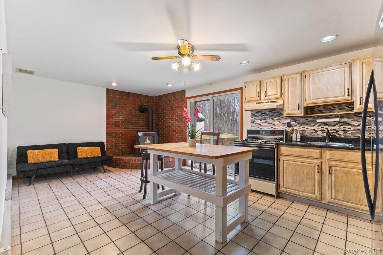 4 Stonewall Farm Road Mahopac, NY 10541 - Photo 3 of 37 In law kitchen in lower level with plenty of cabinet space and gas stove.