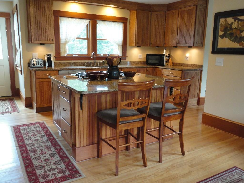 140 Reach Road Brooklin, ME 04616 - Photo 10 of 27 View of kitchen from den- door to...