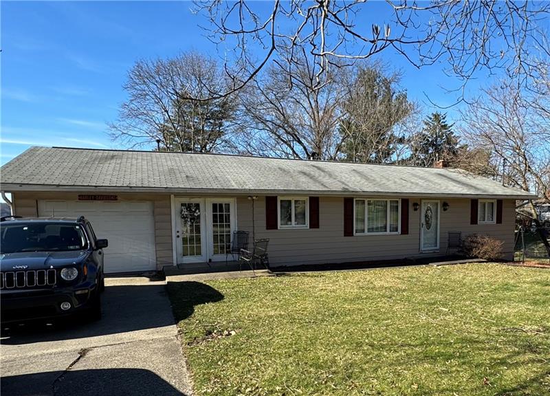 778 Katherine Street Rochester, PA 15074 - Photo 1 of 22 a front view of a house with garden