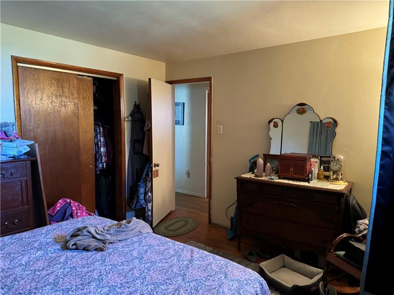 778 Katherine Street Rochester, PA 15074 - Photo 12 of 22 a bedroom with a bed and a dresser
