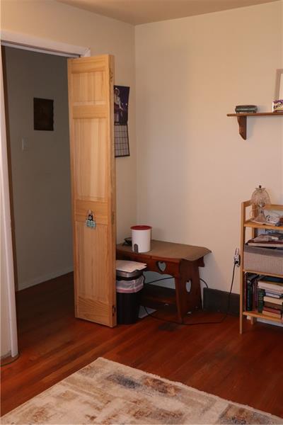 778 Katherine Street Rochester, PA 15074 - Photo 19 of 22 a view of a workspace with furniture and wooden floor