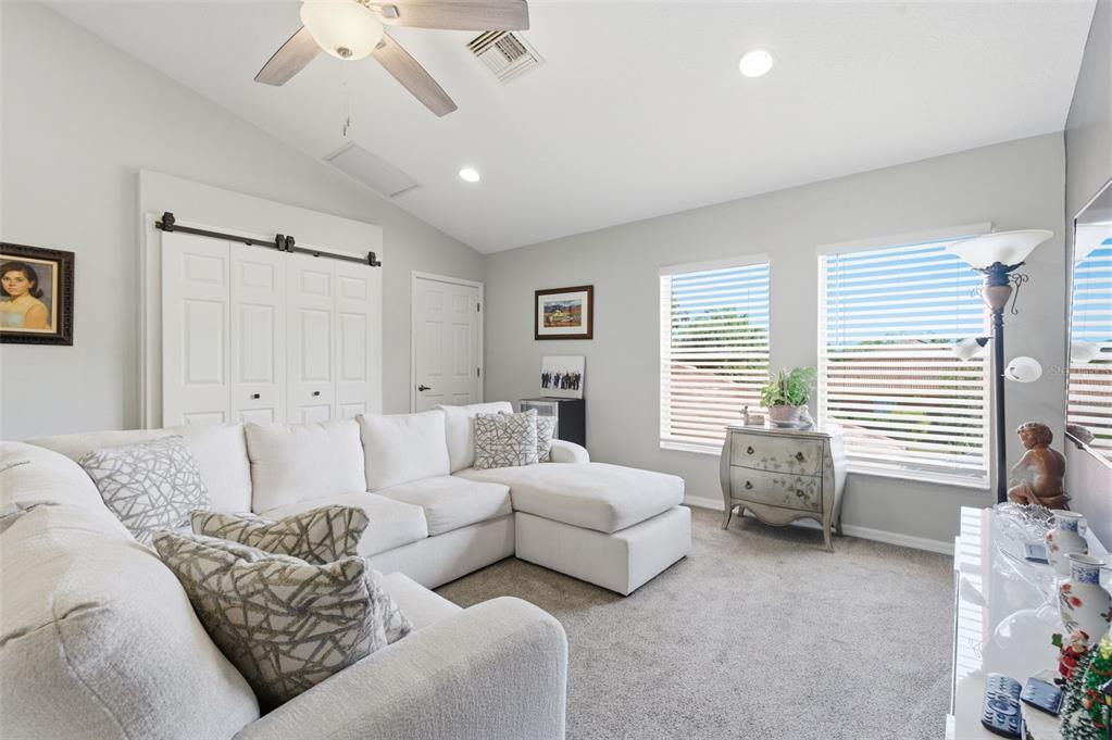 11508 Oyster Bay Circle New Port Richey, FL 34654 - Photo 49 of 98 a living room with furniture and a large window