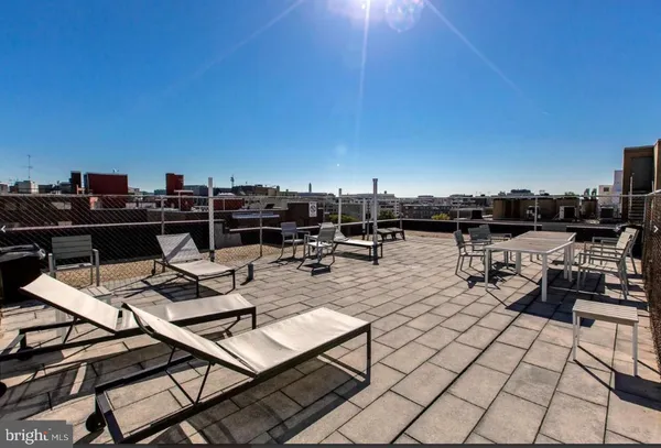 a view of a livingroom with furniture and chandelier