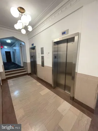 a view of a livingroom with furniture and window