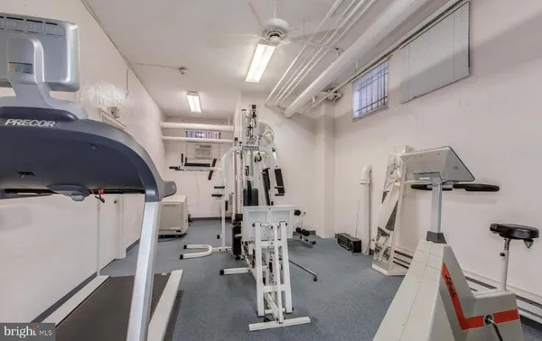 a view of a storage & utility room with washer and dryer