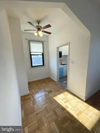 a view of an empty room and window