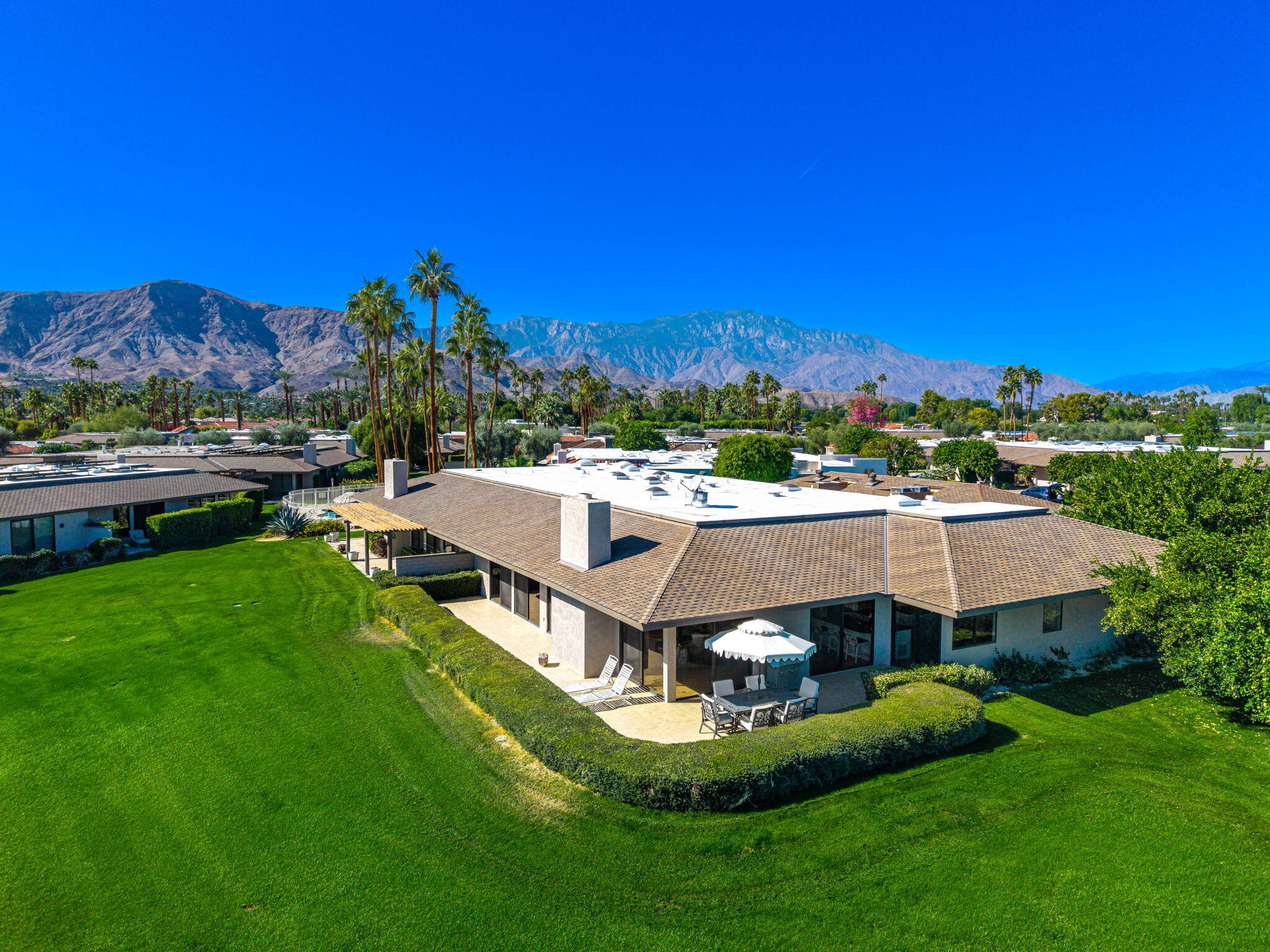 9 Rutgers Court Rancho Mirage, CA 92270 - Photo 11 of 53 a swimming pool with outdoor seating and yard