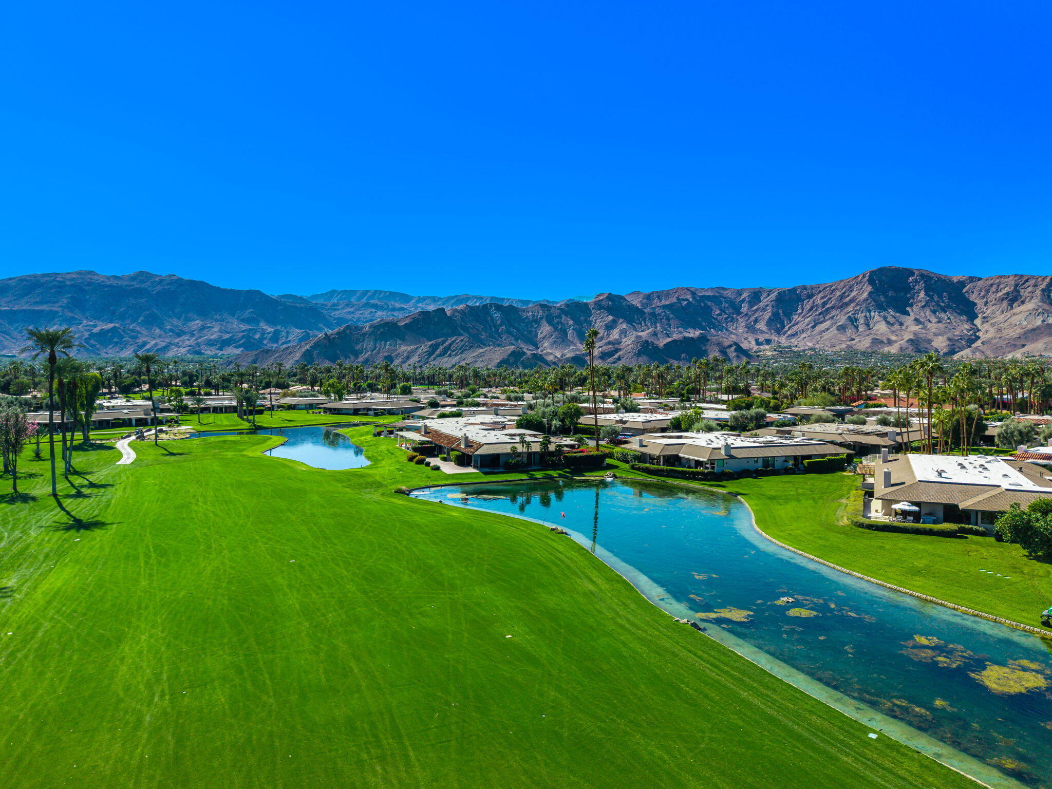 9 Rutgers Court Rancho Mirage, CA 92270 - Photo 13 of 53 a view of a city with lawn chairs