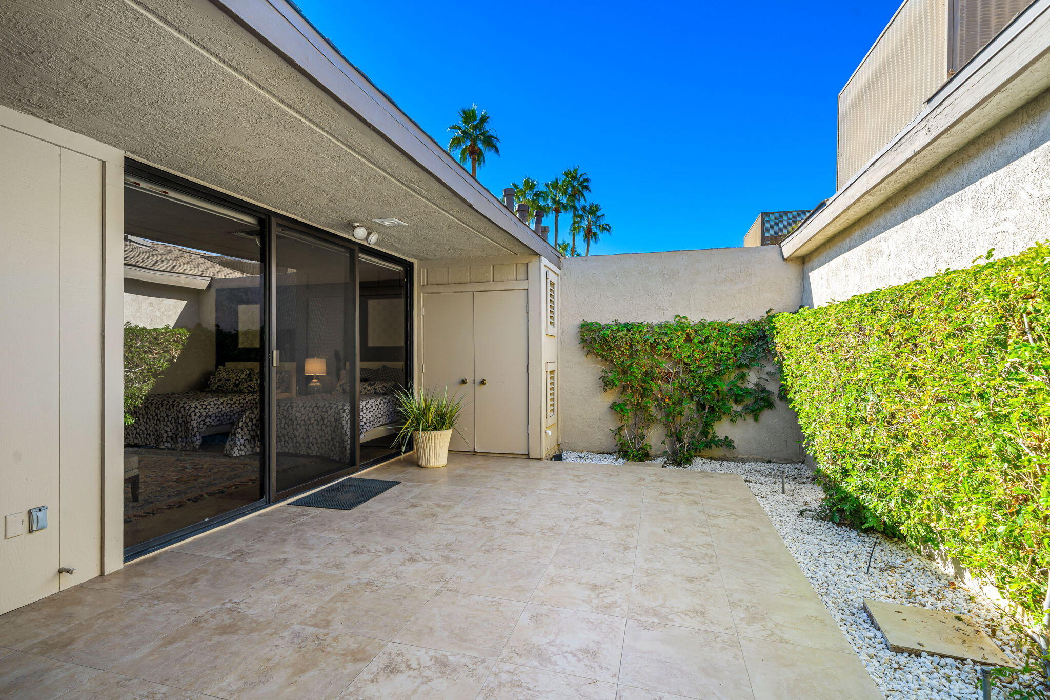 9 Rutgers Court Rancho Mirage, CA 92270 - Photo 16 of 53 a view of a house with backyard