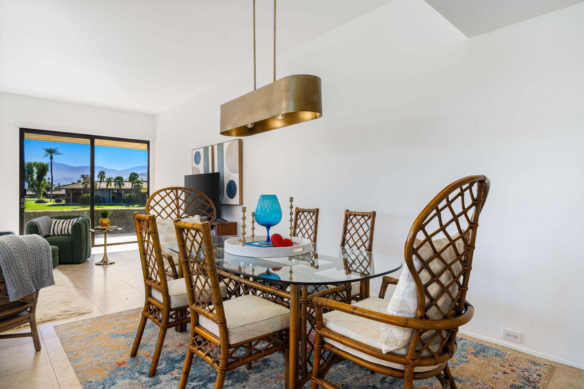 9 Rutgers Court Rancho Mirage, CA 92270 - Photo 21 of 53 a dining room with furniture and wooden floor