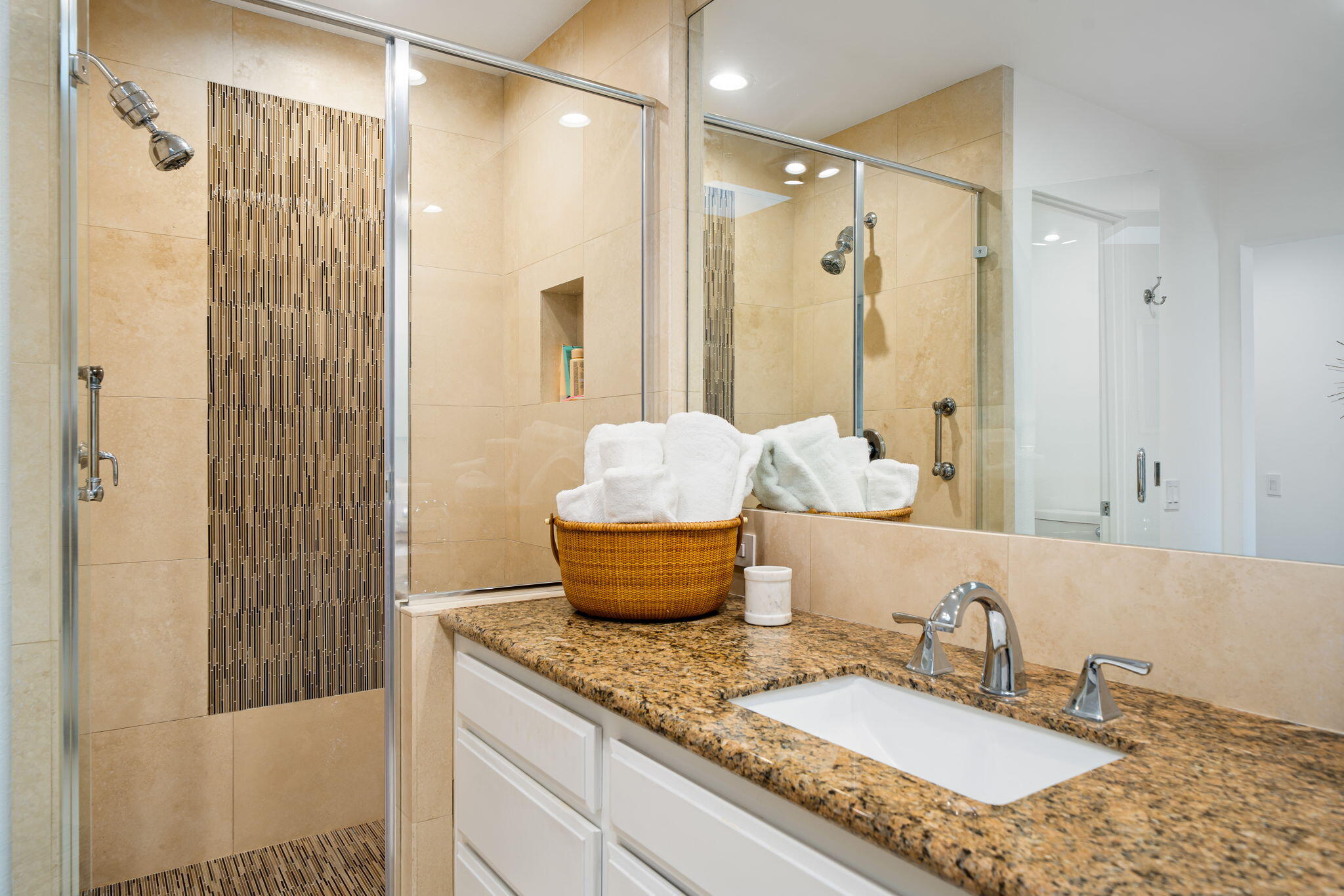 9 Rutgers Court Rancho Mirage, CA 92270 - Photo 42 of 53 a bathroom with a granite countertop sink and a mirror