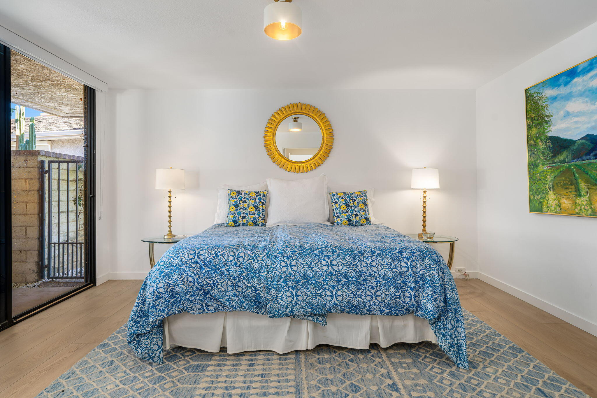 9 Rutgers Court Rancho Mirage, CA 92270 - Photo 43 of 53 a bedroom with a bed and dresser with mirror