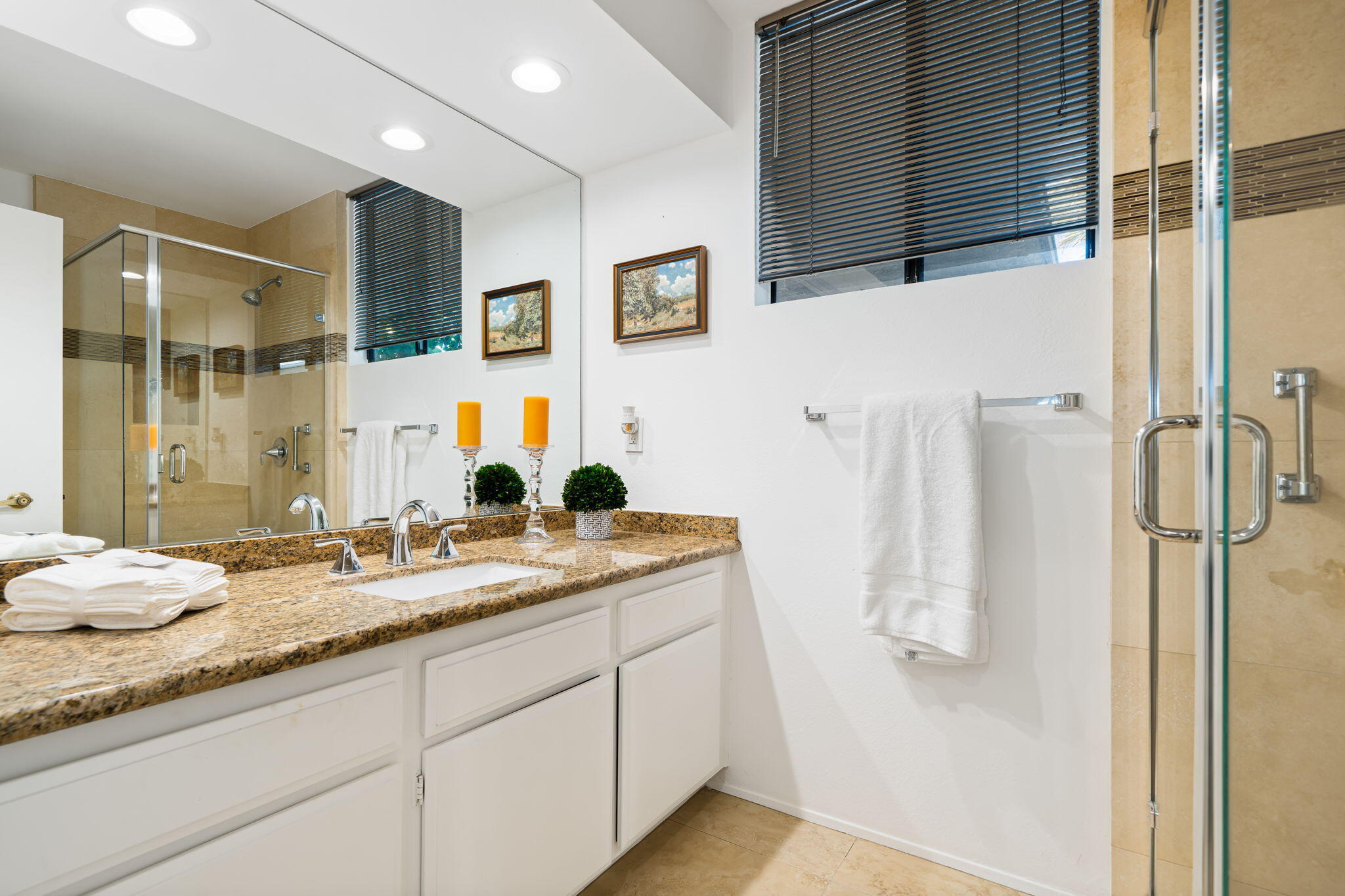 9 Rutgers Court Rancho Mirage, CA 92270 - Photo 45 of 53 a bathroom with a granite countertop shower sink and mirror