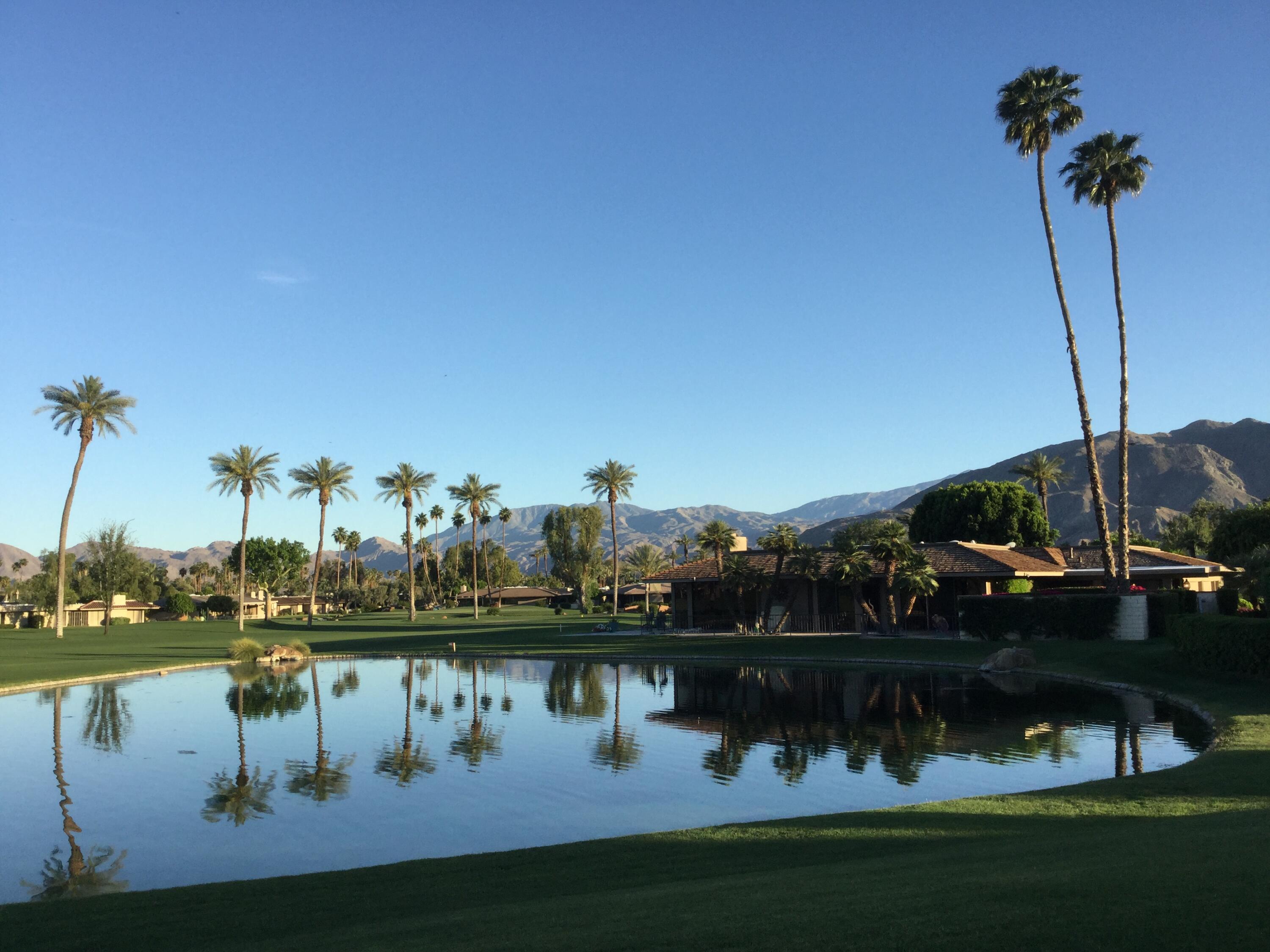 9 Rutgers Court Rancho Mirage, CA 92270 - Photo 52 of 53 a view of a lake with houses in the back