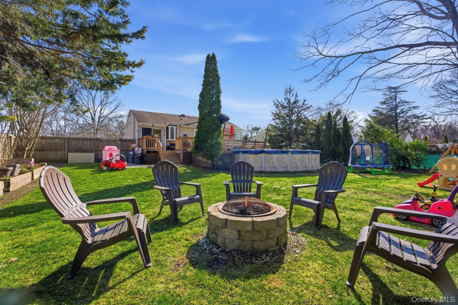 9 Fox Lane Shoreham, NY 11786 - Photo 12 of 13 a view of an outdoor sitting area with furniture and garden