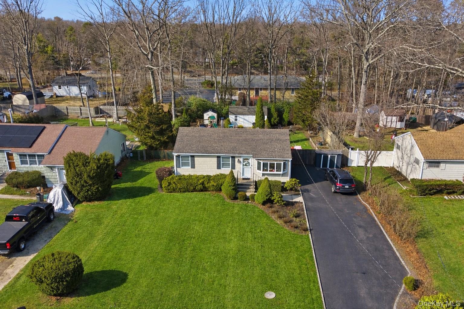 9 Fox Lane Shoreham, NY 11786 - Photo 13 of 13 a view of a house with a back yard