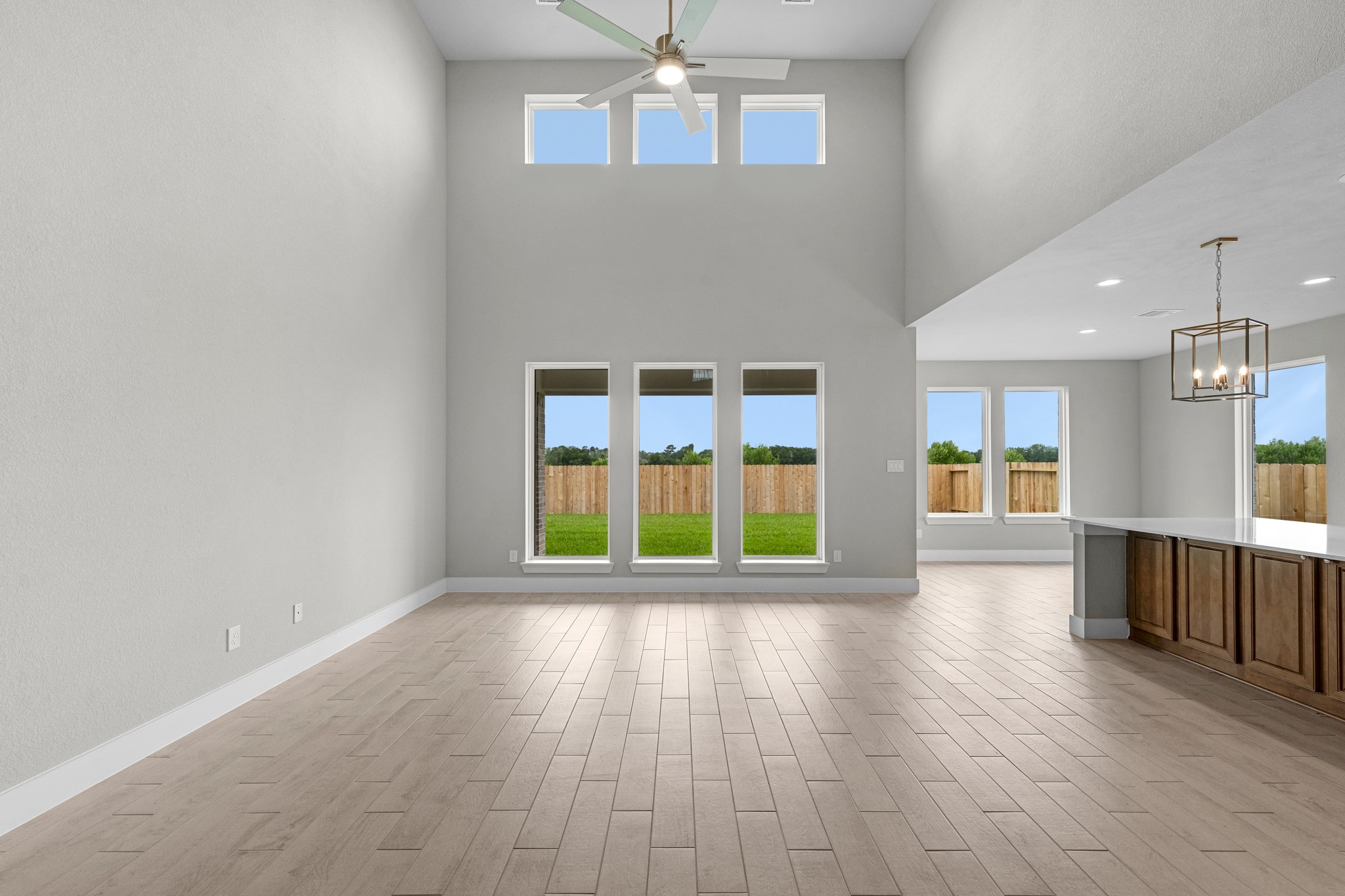 3410 Everglade Lane Rosenberg, TX 77471 - Photo 8 of 39 wooden floor in an empty room with a window