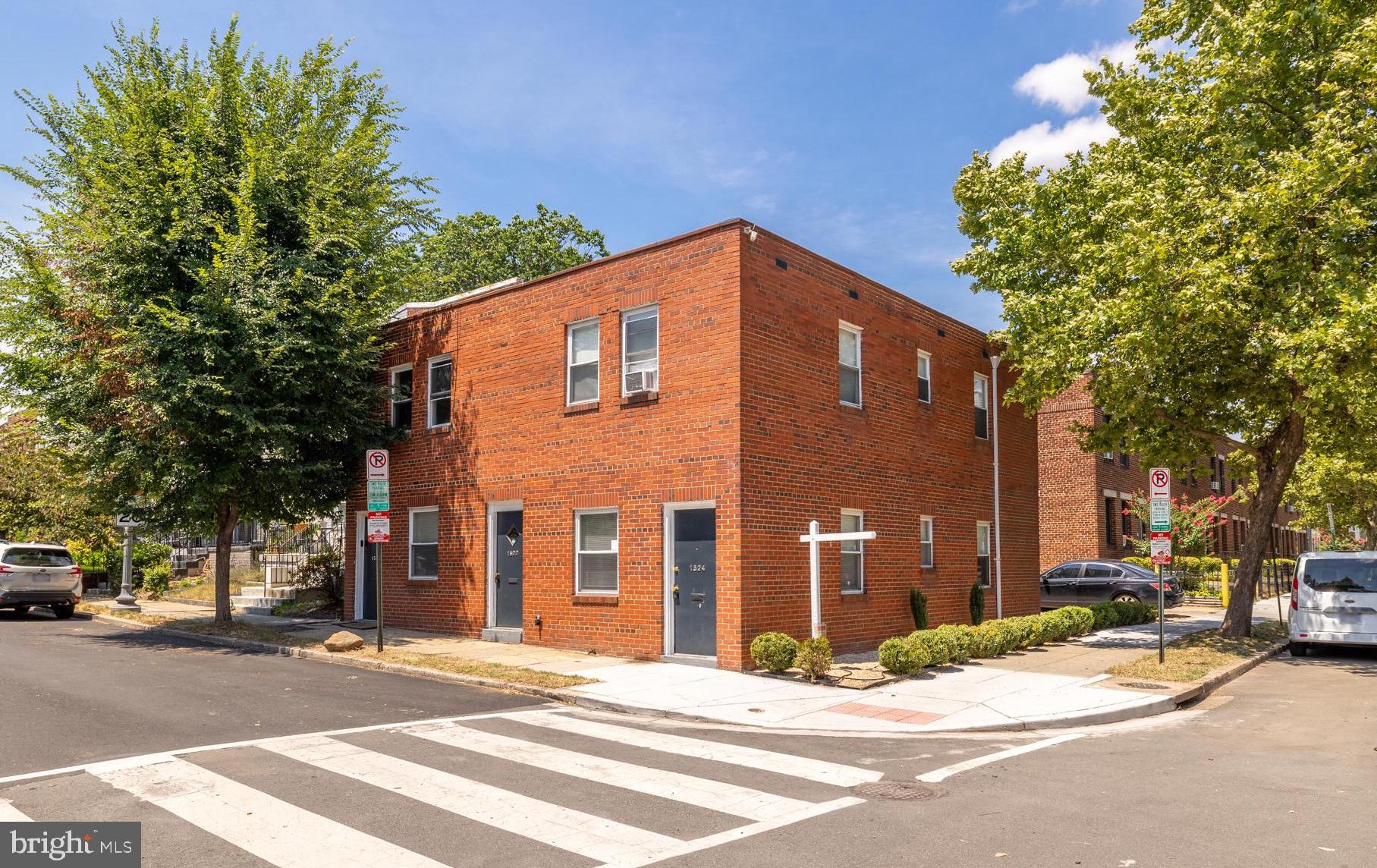 a view of a house with a street