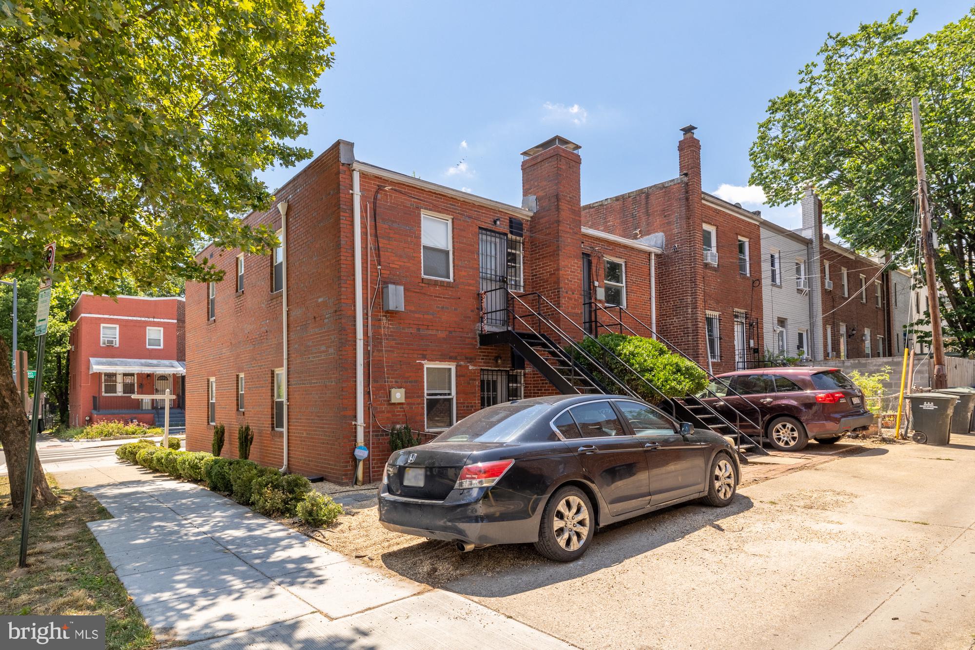 1520-1524 Queen Street Northeast Washington, DC 20002 - Photo 18 of 19 a car parked in front of a building