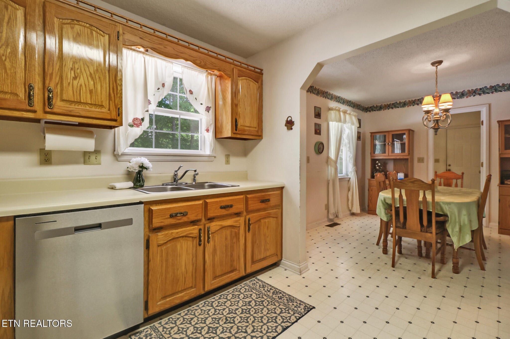 2162 Spruce Loop Crossville, TN 38555 - Photo 11 of 25 a spacious bathroom with a granite countertop sink a mirror and a shower