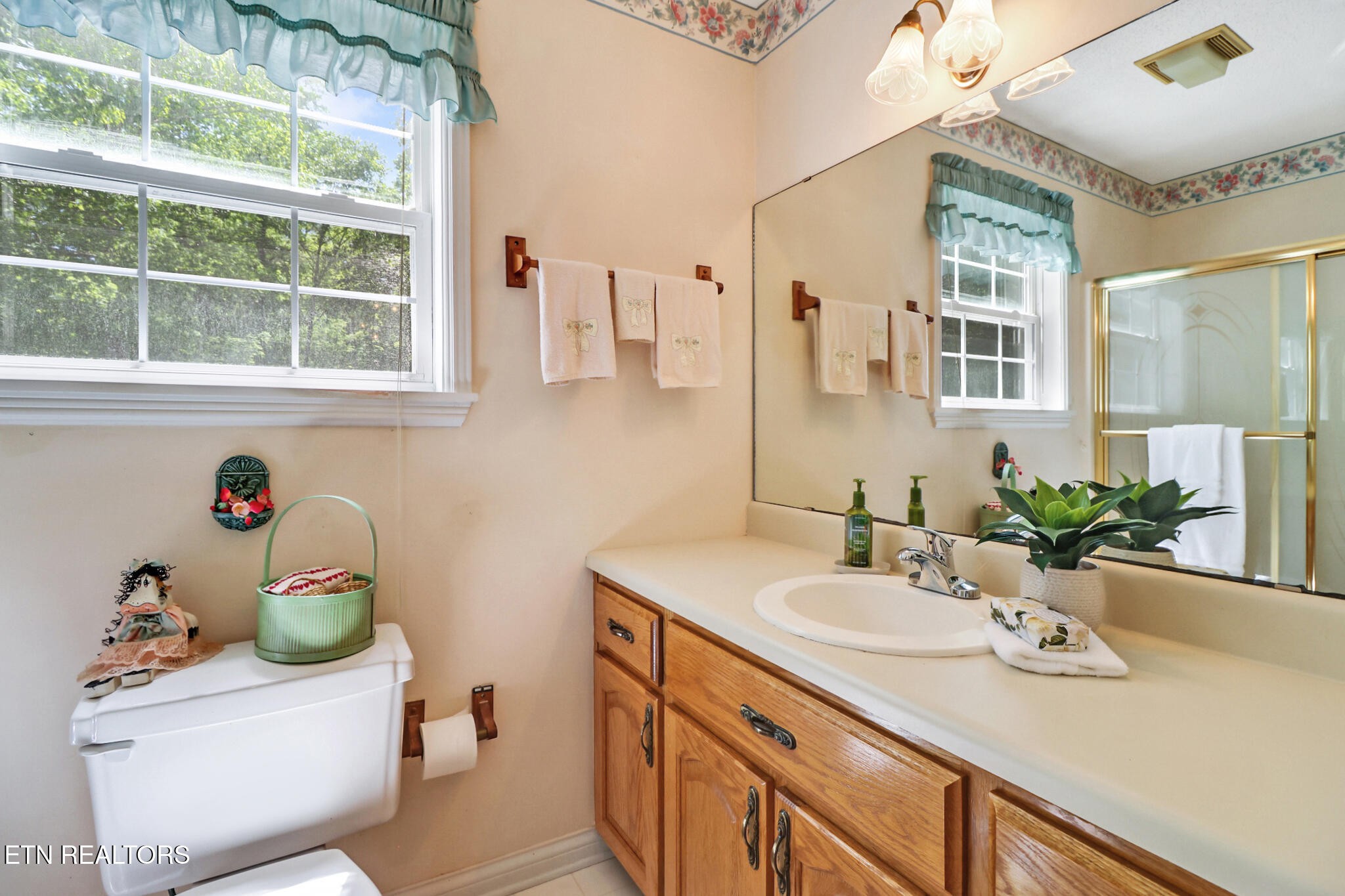 2162 Spruce Loop Crossville, TN 38555 - Photo 17 of 25 a bathroom with a sink mirror vanity and toilet