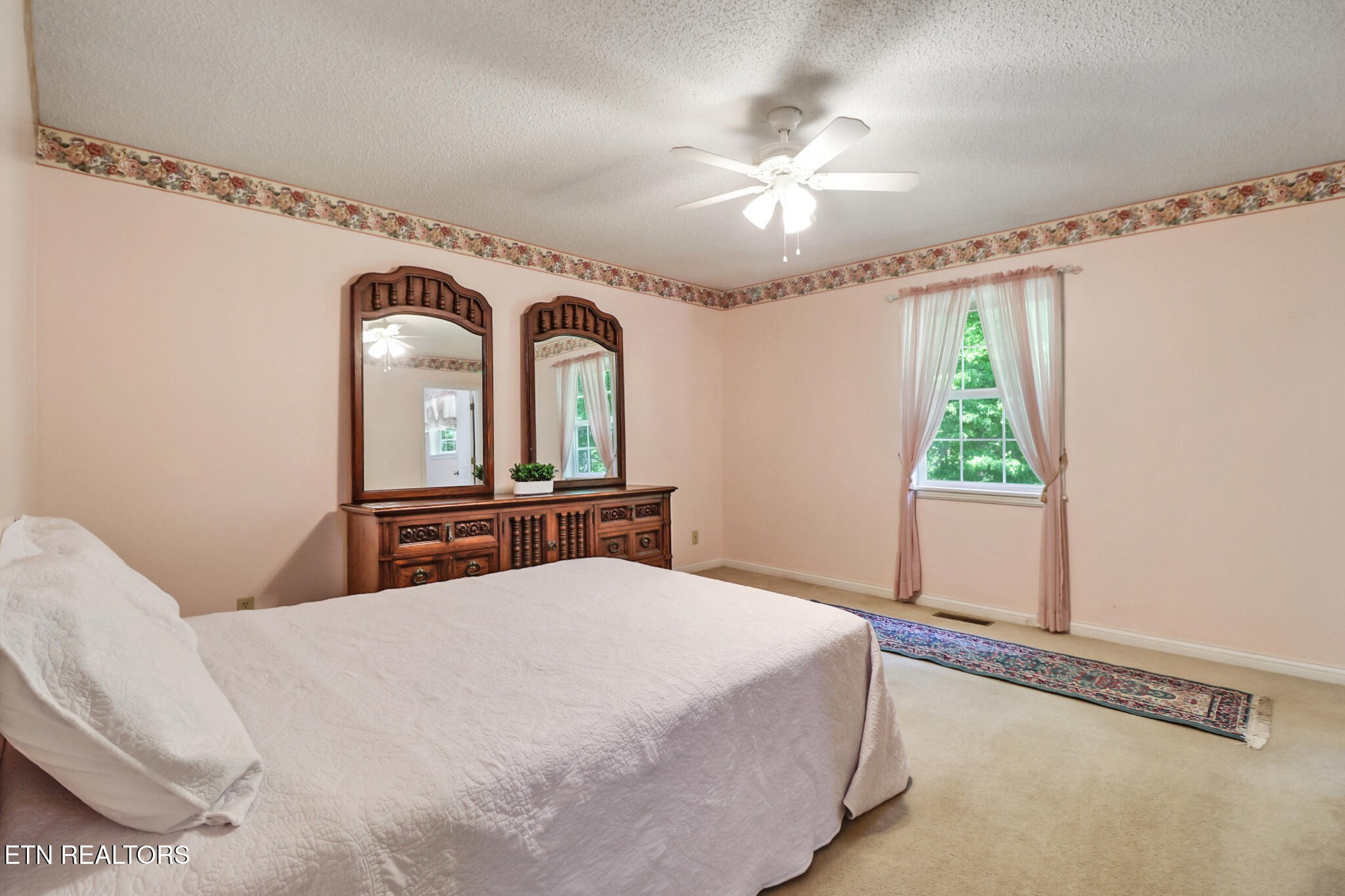 2162 Spruce Loop Crossville, TN 38555 - Photo 19 of 25 a bedroom with a bed and a window