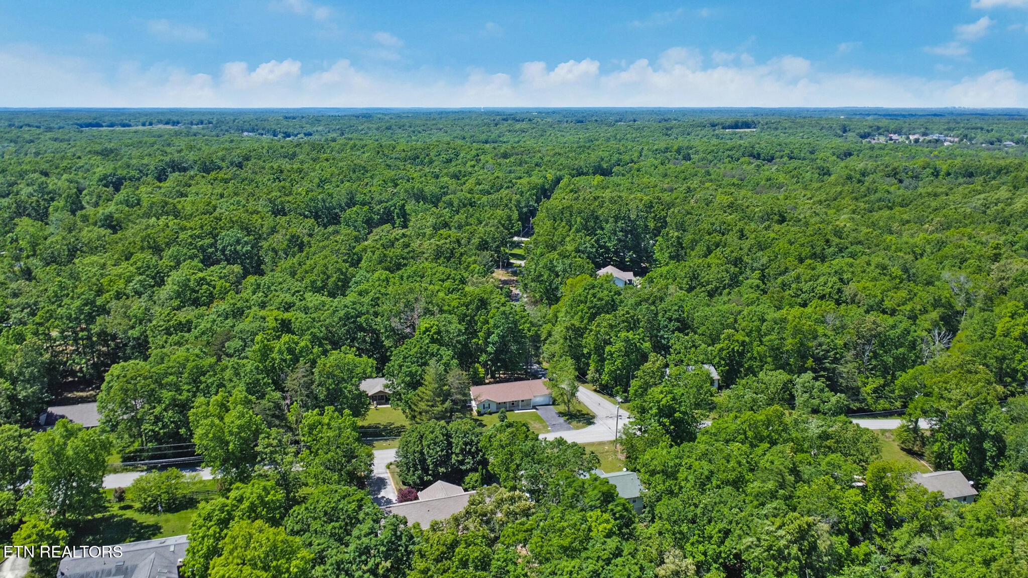 2162 Spruce Loop Crossville, TN 38555 - Photo 9 of 25 a view of a lush green field