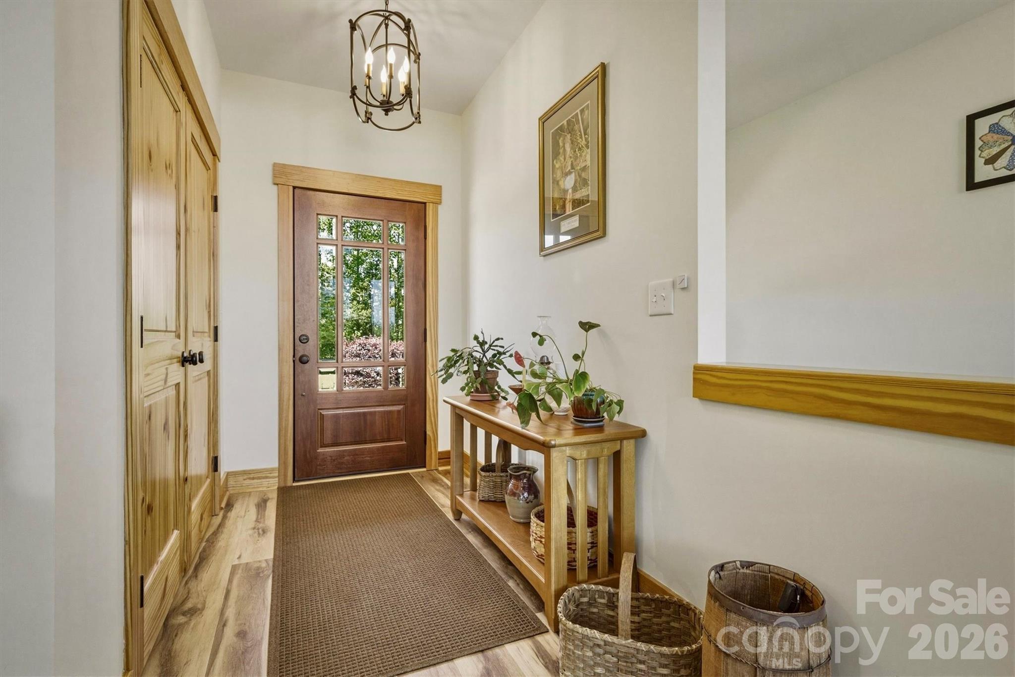 5564 Table View Lane Lenoir, NC 28645 - Photo 6 of 48 a view of a hallway to a livingroom with furniture