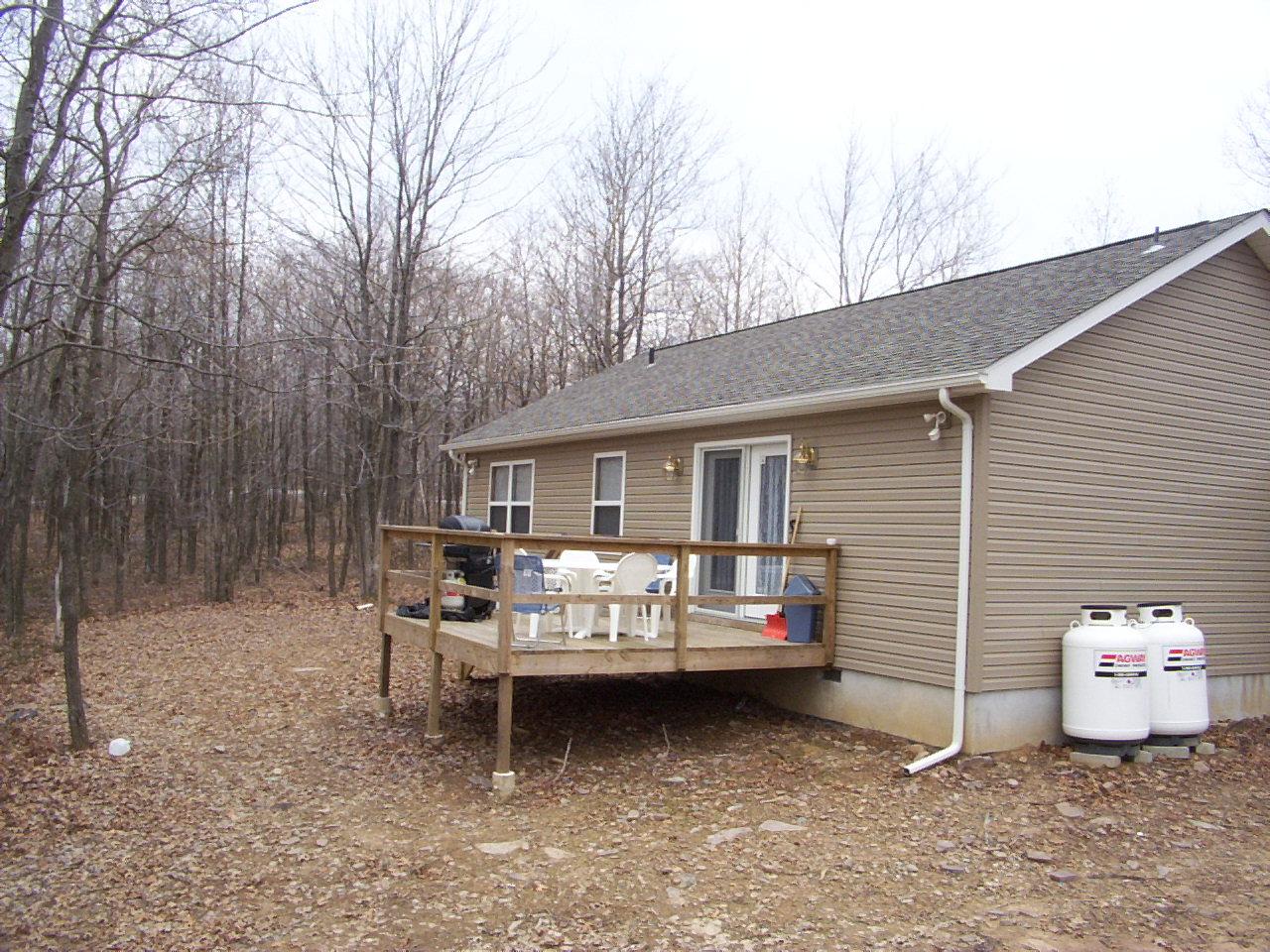 14 Fern Ridge Road Blakeslee, PA 18610 - Photo 2 of 6 a view of a patio with backyard and furniture