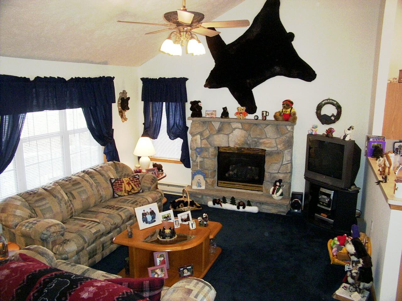 14 Fern Ridge Road Blakeslee, PA 18610 - Photo 4 of 6 a living room with furniture fireplace and flat screen tv