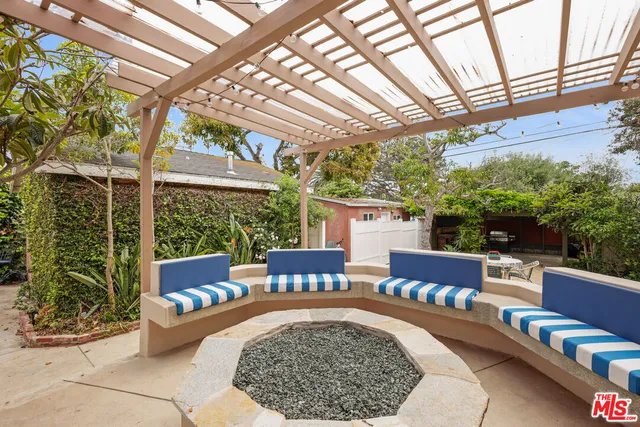 a outdoor living space with furniture and garden view