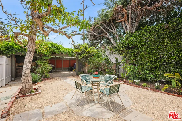 a garden view with a seating space