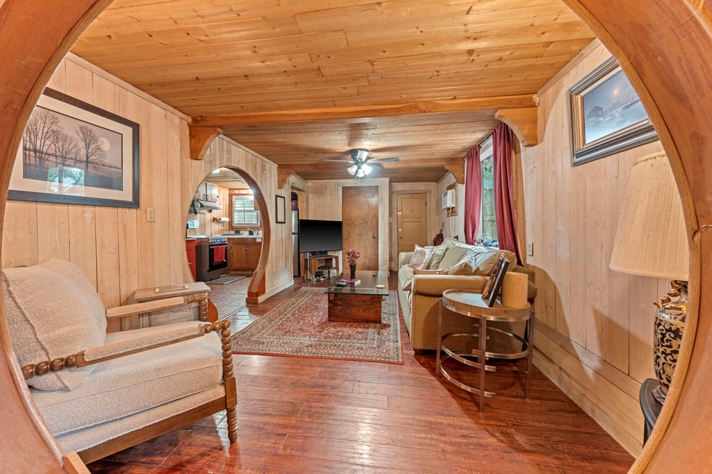 616 Lois Street Kerrville, TX 78028 - Photo 25 of 32 a living room with furniture and a fireplace