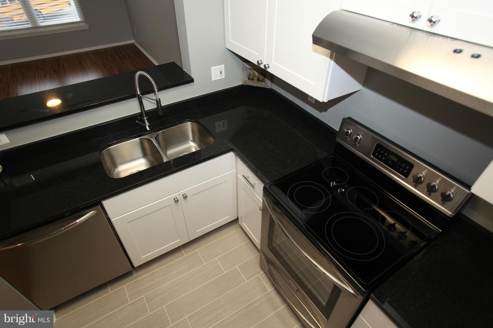 1521 Spring Gate Dr., Unit 10202 McLean, VA 22102 - Photo 15 of 30 Kitchen has brand new appliances