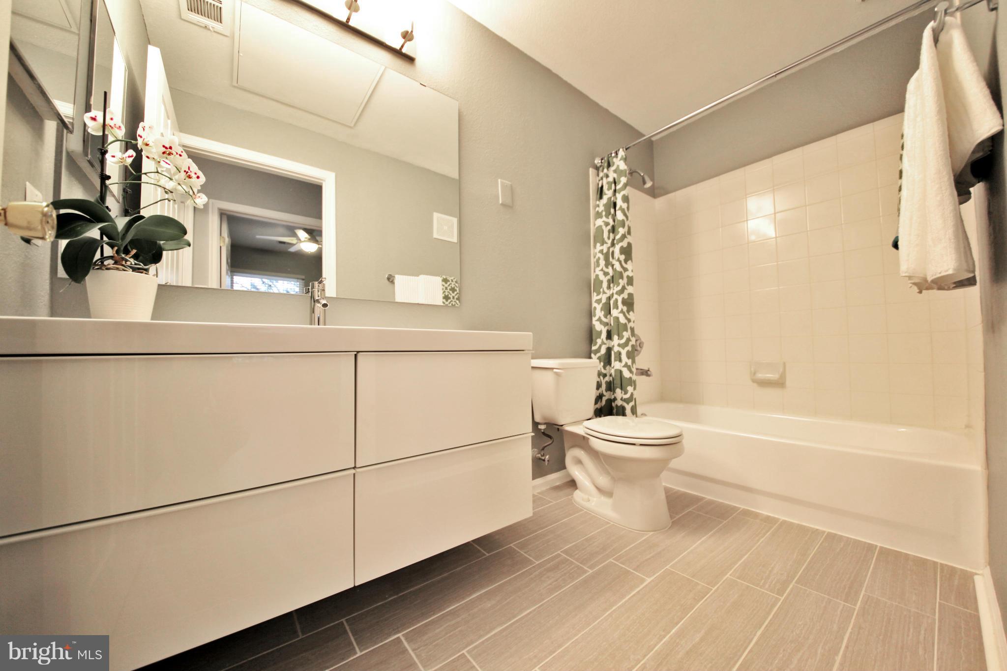 1521 Spring Gate Dr., Unit 10202 McLean, VA 22102 - Photo 4 of 30 Modern bath with large floating vanity